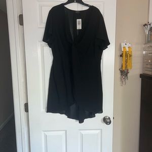 Black hi low shirt. Never worn still has tag.
